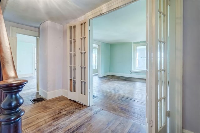 1621 Bragg St, Lima, NY 14485 - hall featuring french doors, wood finished floors, and plenty of natural light