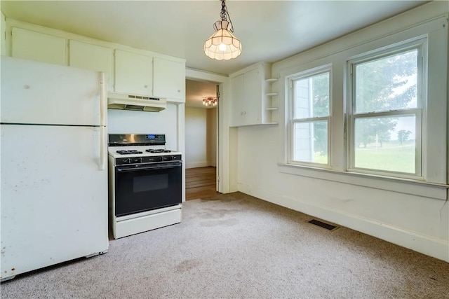1621 Bragg St, Lima, NY 14485 - kitchen with white appliances, under cabinet range hood, light carpet, white cabinetry, and decorative light fixtures