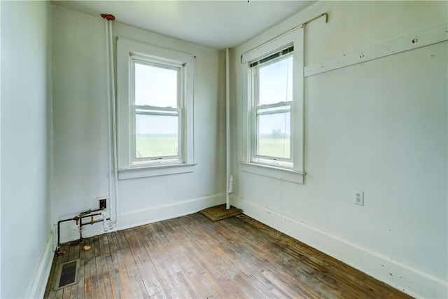 1621 Bragg St, Lima, NY 14485 - unfurnished room featuring hardwood / wood-style flooring and baseboards
