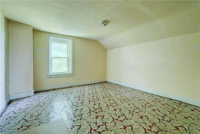 1621 Bragg St, Lima, NY 14485 - additional living space featuring vaulted ceiling and light colored carpet