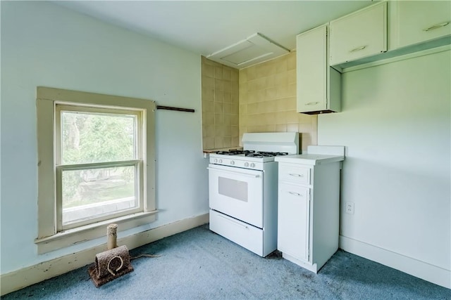 1621 Bragg St, Lima, NY 14485 - kitchen featuring white gas range, light carpet, white cabinetry, and light countertops
