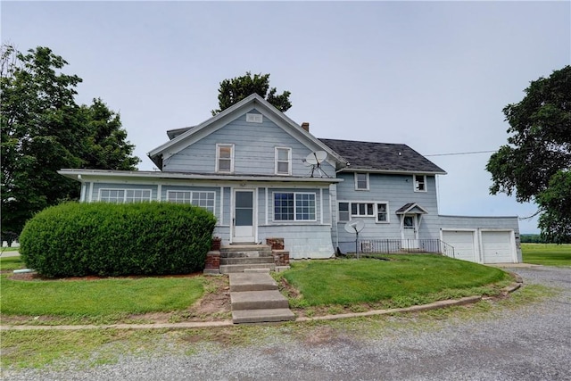 1621 Bragg St, Lima, NY 14485 - traditional home featuring entry steps, a garage, and a front yard