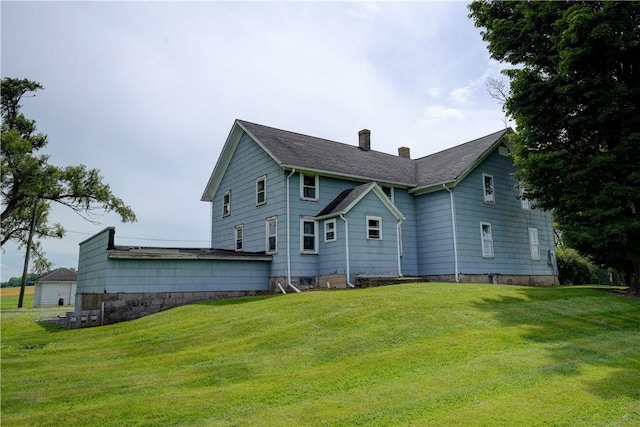 1621 Bragg St, Lima, NY 14485 - rear view of house with a chimney and a yard