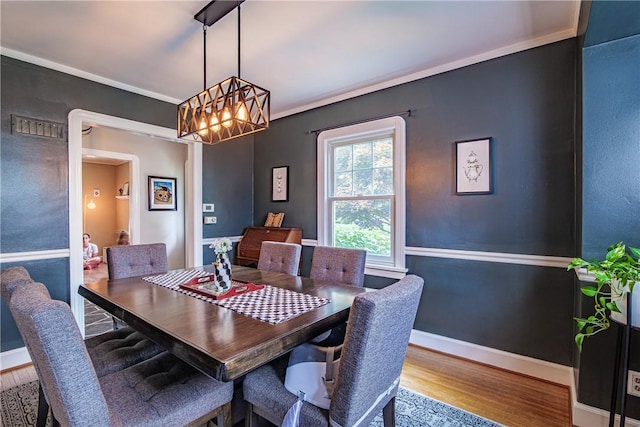 189 Hoover Rd, Irondequoit, NY 14617 - dining space with wood finished floors and a chandelier