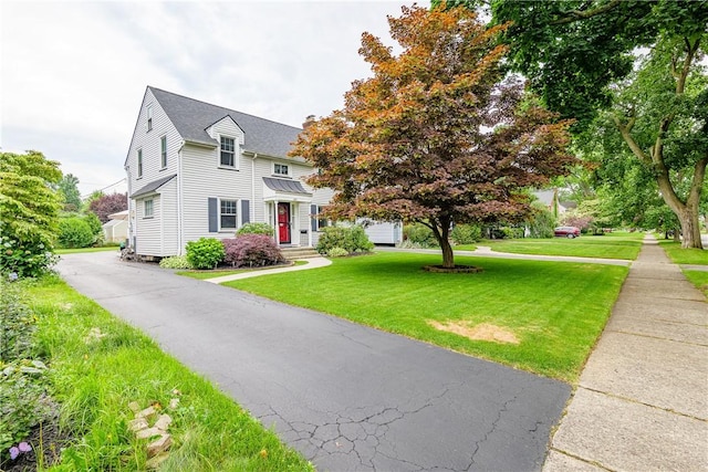 189 Hoover Rd, Irondequoit, NY 14617 - view of front of home with a front lawn and a shingled roof