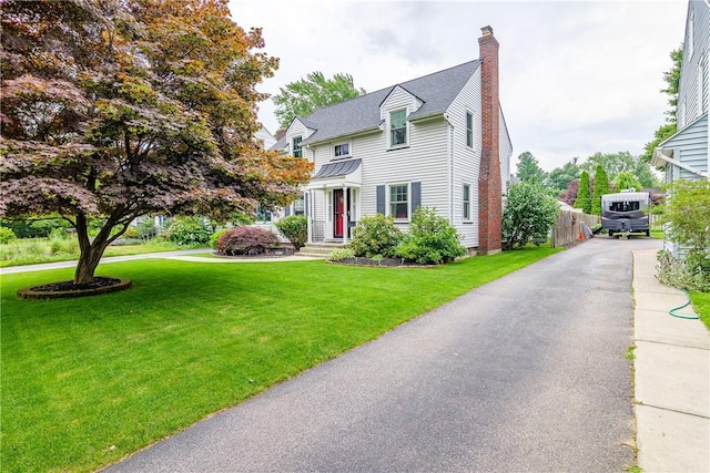 189 Hoover Rd, Irondequoit, NY 14617 - view of front of house featuring a chimney