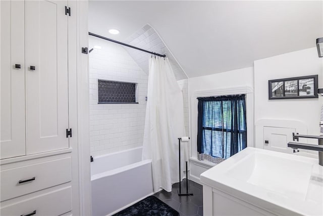 189 Hoover Rd, Irondequoit, NY 14617 - bathroom featuring tile patterned flooring, shower / bath combo with shower curtain, vanity, and vaulted ceiling