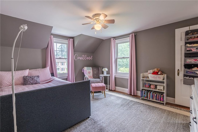 189 Hoover Rd, Irondequoit, NY 14617 - bedroom with multiple windows, vaulted ceiling, and a ceiling fan