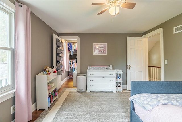189 Hoover Rd, Irondequoit, NY 14617 - bedroom with a spacious closet, a closet, and a ceiling fan