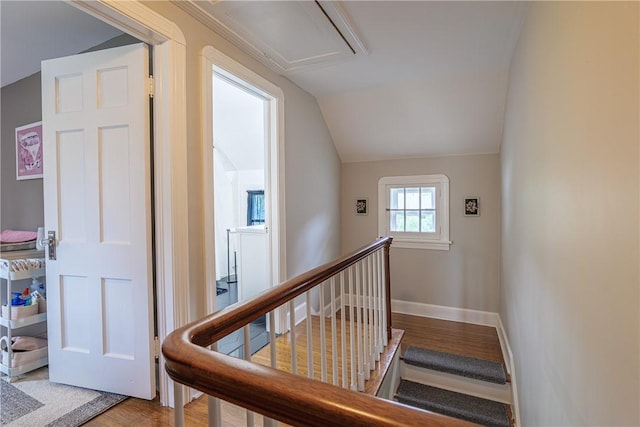 189 Hoover Rd, Irondequoit, NY 14617 - staircase featuring vaulted ceiling and wood finished floors