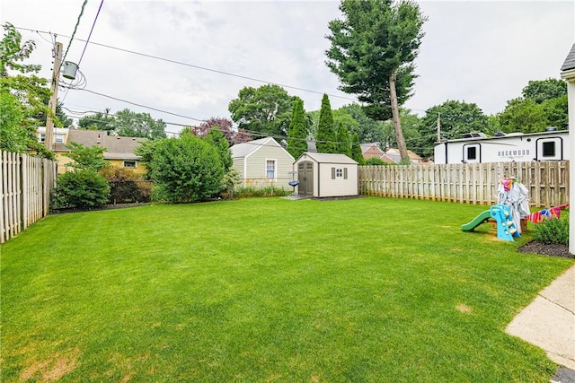189 Hoover Rd, Irondequoit, NY 14617 - fenced backyard featuring a storage unit