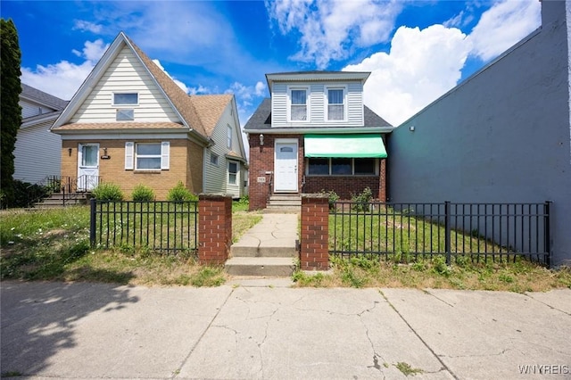 2906 Pine Ave, Niagara Falls, NY 14301 - bungalow featuring brick siding and a fenced front yard