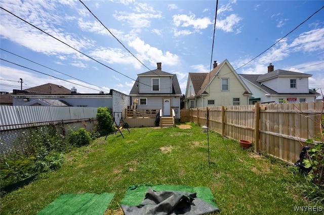 2906 Pine Ave, Niagara Falls, NY 14301 - rear view of property with a fenced backyard