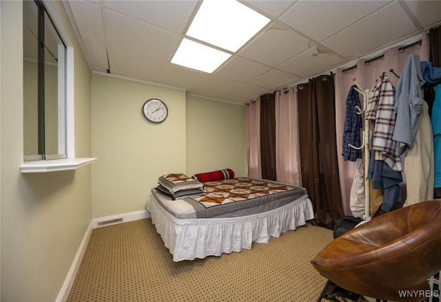 2906 Pine Ave, Niagara Falls, NY 14301 - carpeted bedroom featuring a drop ceiling and baseboards
