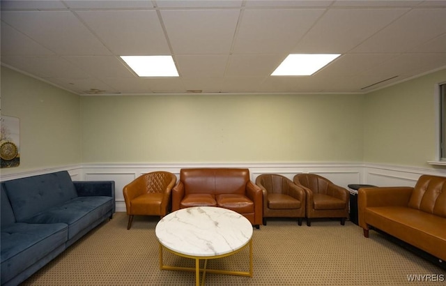 2906 Pine Ave, Niagara Falls, NY 14301 - living room with light colored carpet, a wainscoted wall, a drop ceiling, a decorative wall, and crown molding