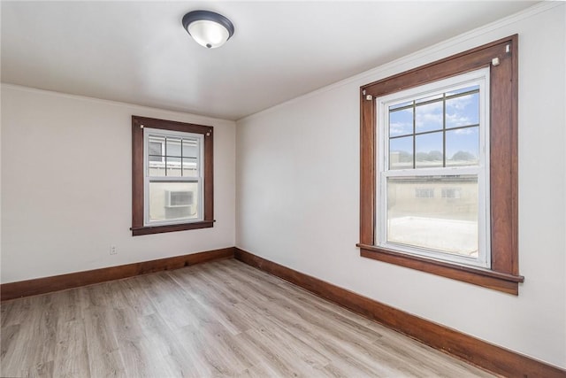 1570 Mount Hope Ave, Rochester, NY 14620 - spare room featuring light wood-style flooring and ornamental molding