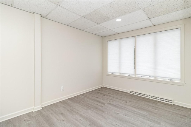 1570 Mount Hope Ave, Rochester, NY 14620 - unfurnished room with a drop ceiling, wood finished floors, and recessed lighting