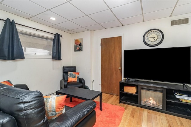 1570 Mount Hope Ave, Rochester, NY 14620 - living room with a paneled ceiling, wood finished floors, and recessed lighting
