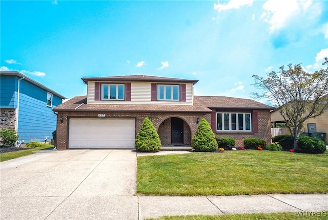 117 Colony St, Lancaster, NY 14043 - view of front facade with brick siding, concrete driveway, a front yard, an attached garage, and roof with shingles