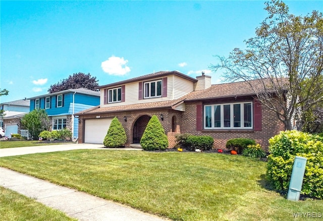 117 Colony St, Lancaster, NY 14043 - split level home with driveway, brick siding, an attached garage, a chimney, and a front yard