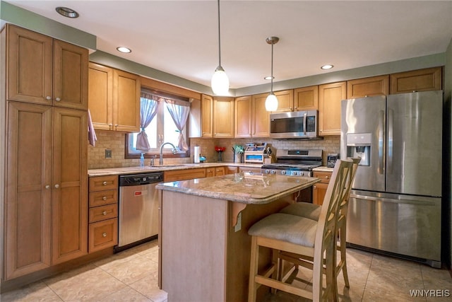 117 Colony St, Lancaster, NY 14043 - kitchen with stainless steel appliances, light tile patterned flooring, a kitchen island, decorative backsplash, and recessed lighting