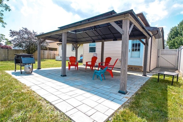 117 Colony St, Lancaster, NY 14043 - fenced backyard with a gazebo, a gate, and a patio