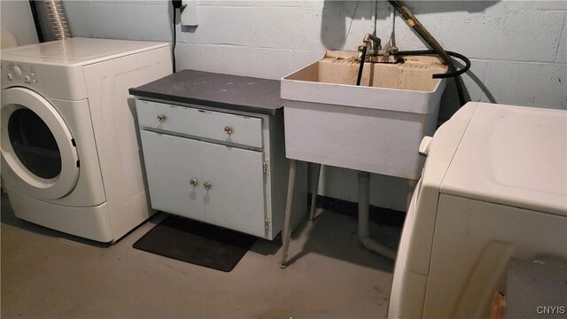582 Peck Rd, Sullivan, NY 13082 - washroom featuring washer / dryer and concrete block wall