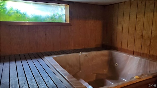 582 Peck Rd, Sullivan, NY 13082 - full bath with a relaxing sauna, a jetted tub, and wooden walls