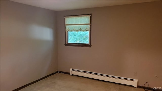 582 Peck Rd, Sullivan, NY 13082 - unfurnished room featuring baseboard heating and light carpet