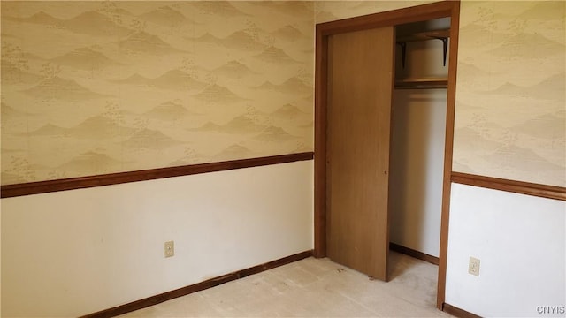 582 Peck Rd, Sullivan, NY 13082 - unfurnished bedroom with wallpapered walls and a closet