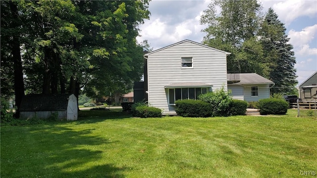 582 Peck Rd, Sullivan, NY 13082 - rear view of property with a storage shed and a yard