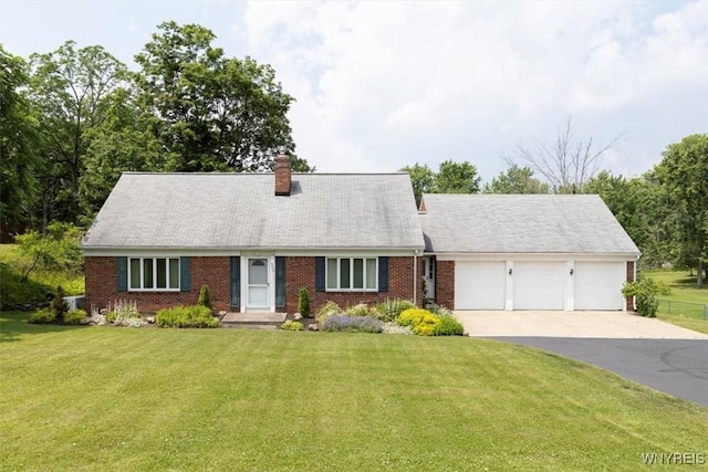 356 Union Rd, West Seneca, NY 14224 - cape cod house with a garage, driveway, a front yard, and brick siding