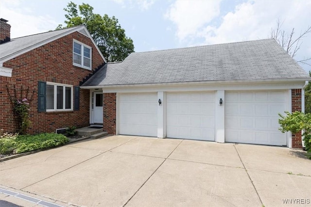 356 Union Rd, West Seneca, NY 14224 - traditional-style home with brick siding, a chimney, roof with shingles, and a garage