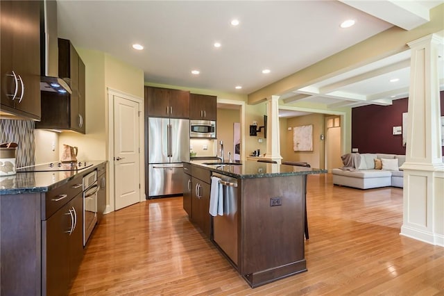 1537 Cranberry Pond, Victor, NY 14564 - kitchen featuring decorative columns, appliances with stainless steel finishes, dark brown cabinets, light wood finished floors, and beamed ceiling