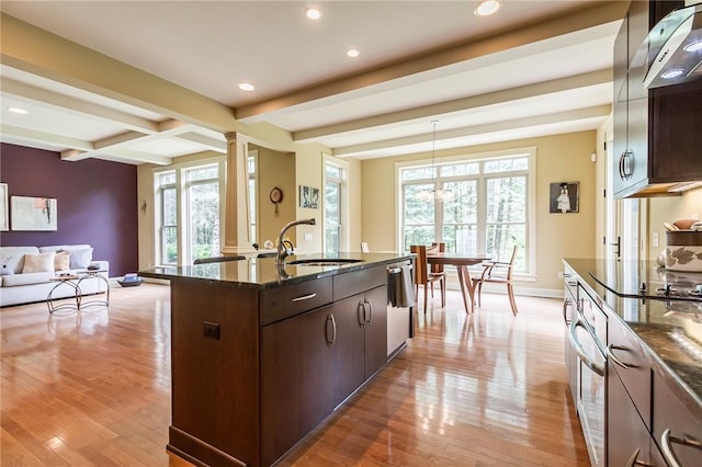 1537 Cranberry Pond, Victor, NY 14564 - kitchen with beamed ceiling, open floor plan, dishwasher, black electric cooktop, and dark stone counters