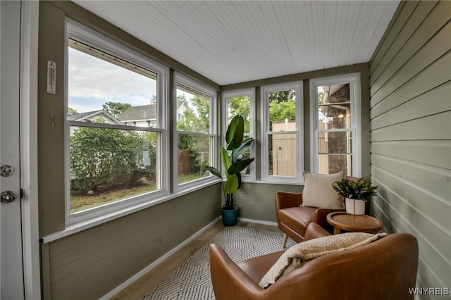 201 Ohio St, Ridgeway, NY 14103 - sunroom / solarium with healthy amount of natural light, wood finished floors, and wood ceiling