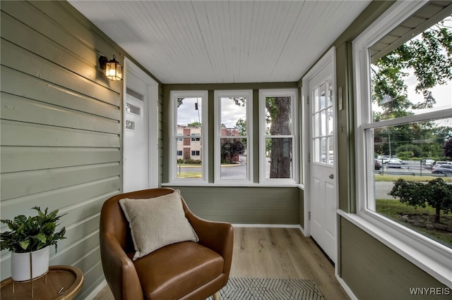 201 Ohio St, Ridgeway, NY 14103 - sunroom / solarium with healthy amount of natural light, wood finished floors, and wooden ceiling