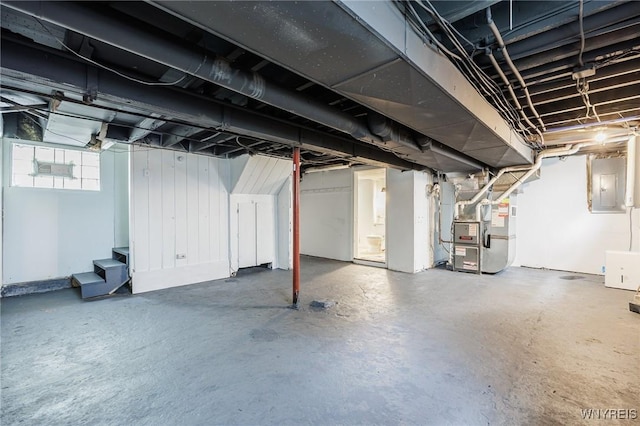 72 Manchester St, Rochester, NY 14621 - basement featuring heating unit and electric panel