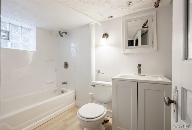 72 Manchester St, Rochester, NY 14621 - full bathroom with wood finished floors, a textured ceiling, vanity, and shower / bath combination