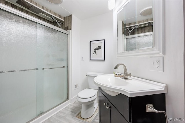72 Manchester St, Rochester, NY 14621 - full bath with vanity, a shower stall, and wood finished floors