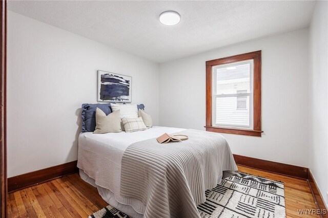 72 Manchester St, Rochester, NY 14621 - bedroom featuring wood-type flooring