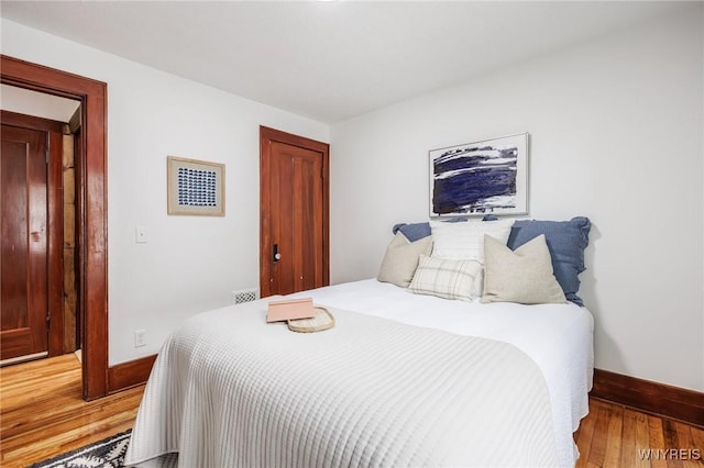 72 Manchester St, Rochester, NY 14621 - bedroom with light wood-type flooring and a closet