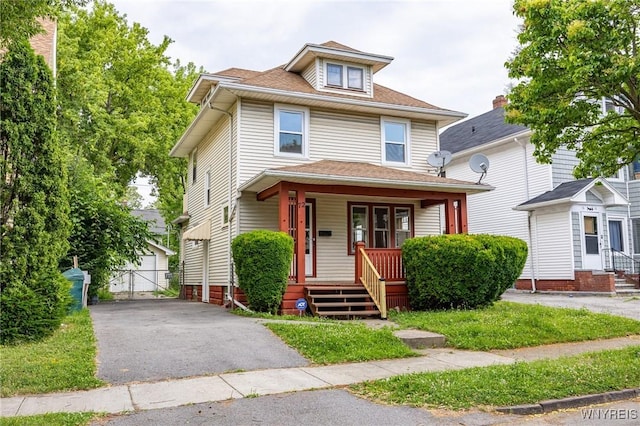 72 Manchester St, Rochester, NY 14621 - american foursquare style home featuring covered porch, a detached garage, an outdoor structure, and roof with shingles