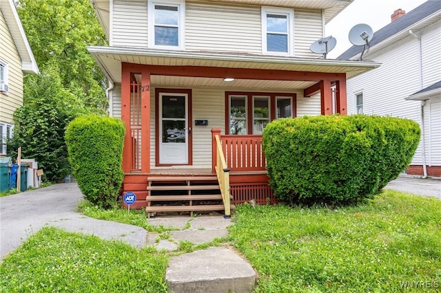 72 Manchester St, Rochester, NY 14621 - property entrance featuring a porch