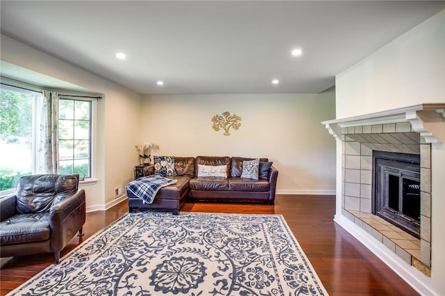 47 Stonington Dr, Pittsford, NY 14534 - living area featuring a tiled fireplace, dark wood-type flooring, and recessed lighting