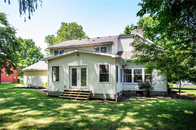 47 Stonington Dr, Pittsford, NY 14534 - back of house featuring entry steps, french doors, a yard, and a chimney