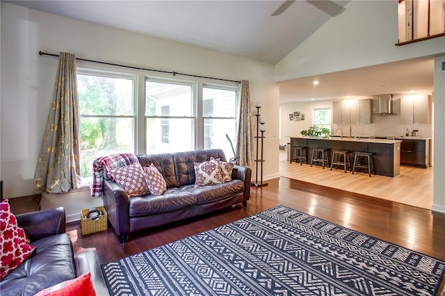 47 Stonington Dr, Pittsford, NY 14534 - living room featuring wood finished floors, lofted ceiling, and ceiling fan
