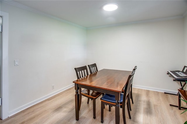 47 Stonington Dr, Pittsford, NY 14534 - dining room featuring light wood finished floors and crown molding
