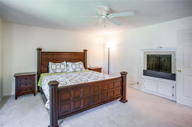 47 Stonington Dr, Pittsford, NY 14534 - bedroom featuring light carpet, a ceiling fan, and a tile fireplace