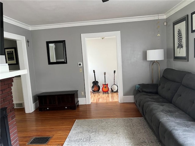 78 Falleson Rd, Rochester, NY 14612 - living room with wood finished floors, crown molding, and a brick fireplace